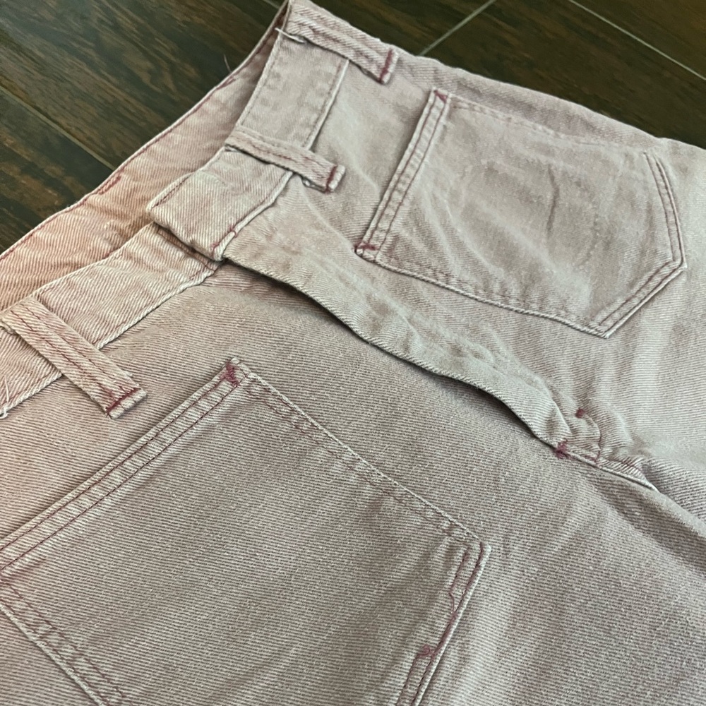 Vintage mauve bell bottoms with floral detail